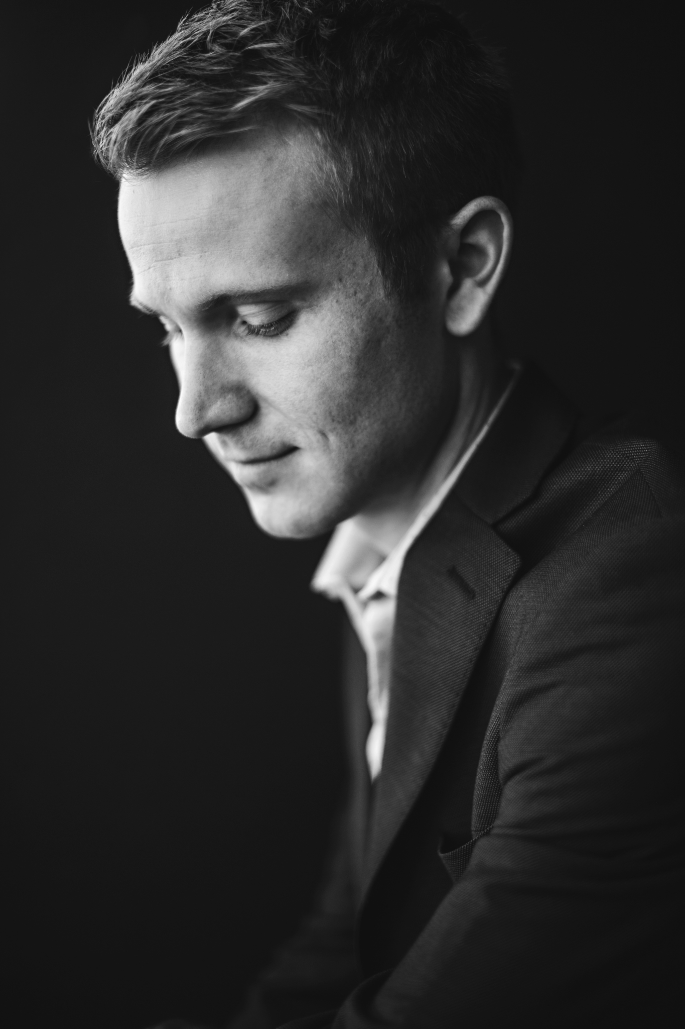Black-and-white portrait of Connor O’Kane
