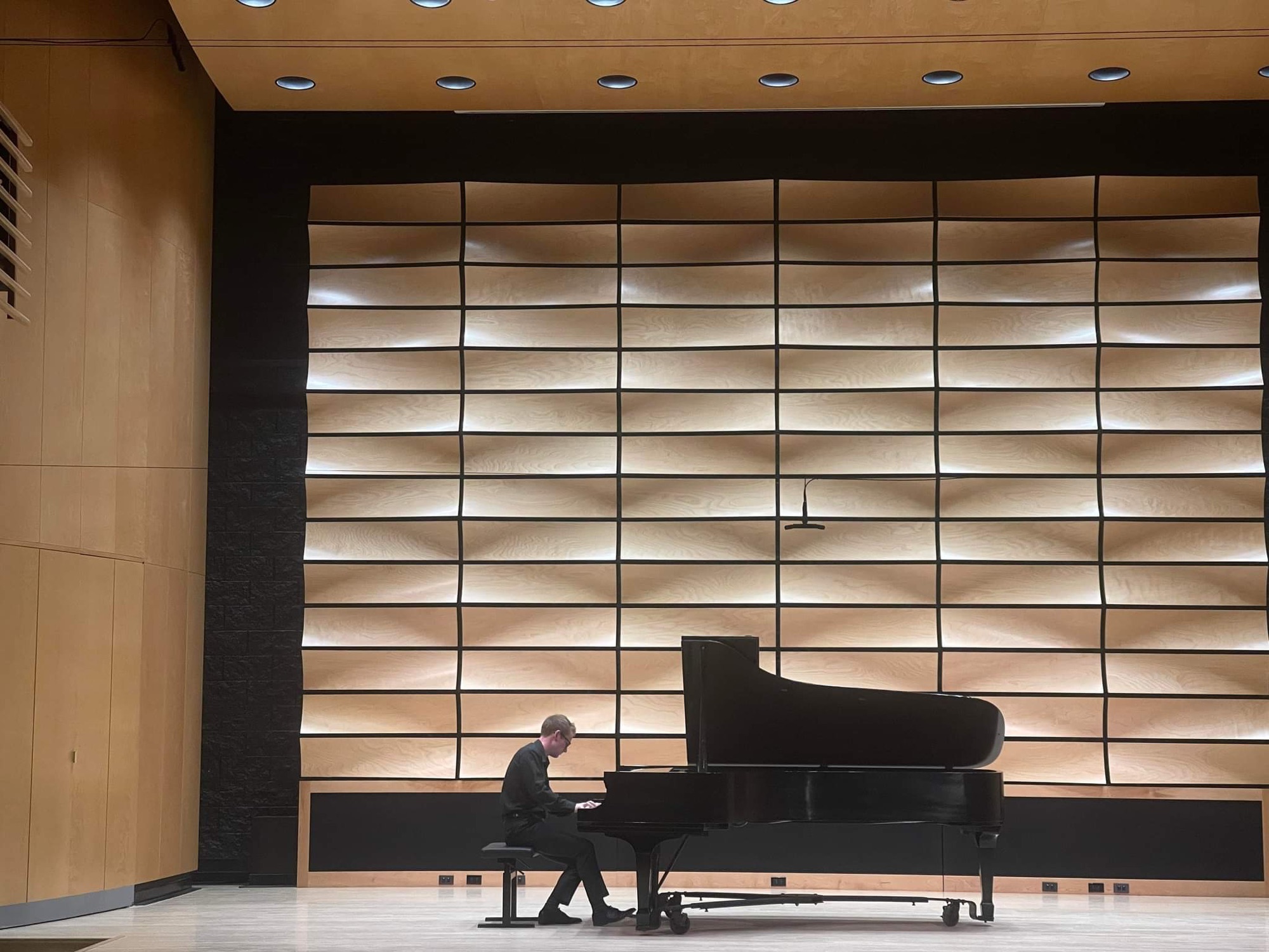 Connor O’Kane performing in a recital hall